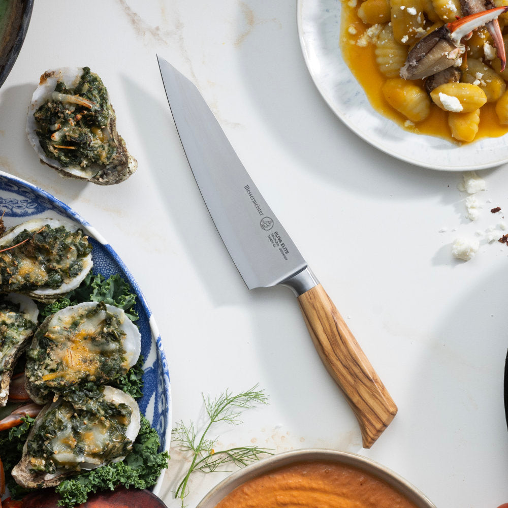 Messermeister Oliva Elite 6.5-inch O.T. Prep Knife in Use on Table