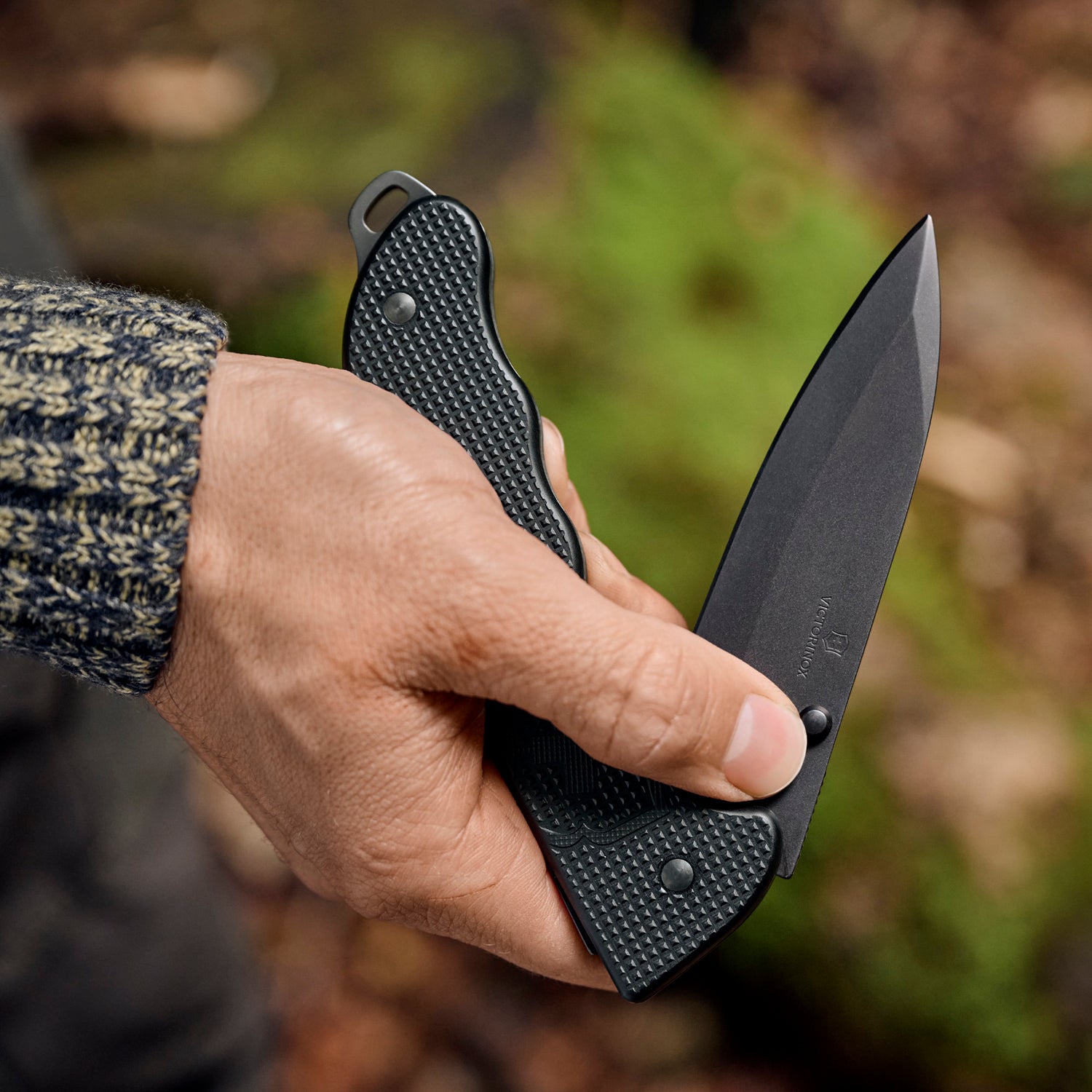 Large Pocket Knife on wooded background
