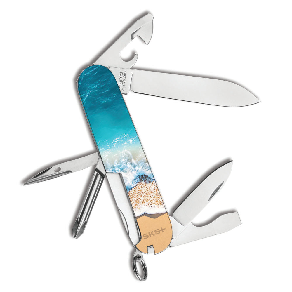 Victorinox Life's a Beach Tinker Designer Swiss Army Knife Back View with Crashing Surf