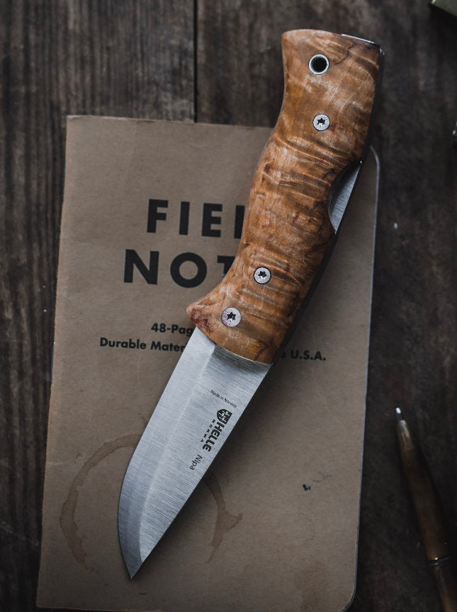 Pocket Knife on wooden table